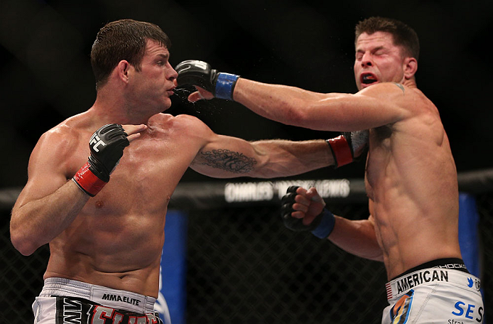 TORONTO, CANADA - SEPTEMBER 22: (L-R) Michael Bisping punches Brian Stann during their middleweight bout at UFC 152 inside Air Canada Centre on September 22, 2012 in Toronto, Ontario, Canada. (Photo by Josh Hedges/Zuffa LLC/Zuffa LLC via Getty Images)