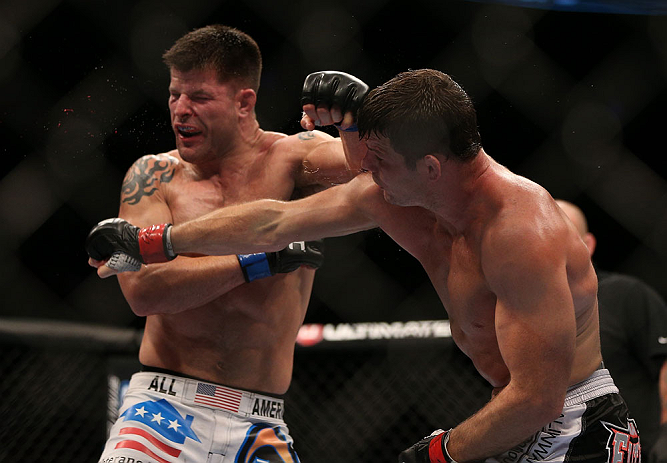 TORONTO, CANADA - SEPTEMBER 22: (R-L) Michael Bisping punches Brian Stann during their middleweight bout at UFC 152 inside Air Canada Centre on September 22, 2012 in Toronto, Ontario, Canada. (Photo by Josh Hedges/Zuffa LLC/Zuffa LLC via Getty Images)