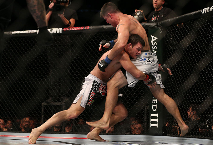 TORONTO, CANADA - SEPTEMBER 22: (L-R) Michael Bisping takes down Brian Stann during their middleweight bout at UFC 152 inside Air Canada Centre on September 22, 2012 in Toronto, Ontario, Canada. (Photo by Josh Hedges/Zuffa LLC/Zuffa LLC via Getty Images)