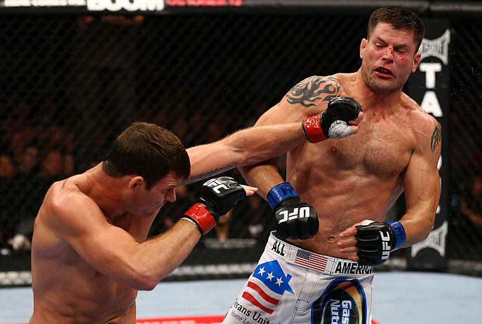 TORONTO, CANADA - SEPTEMBER 22: (L-R) Michael Bisping punches Brian Stann during their middleweight bout at UFC 152 inside Air Canada Centre on September 22, 2012 in Toronto, Ontario, Canada. (Photo by Al Bello/Zuffa LLC/Zuffa LLC via Getty Images)