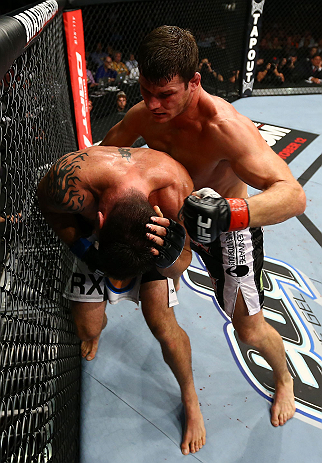 TORONTO, CANADA - SEPTEMBER 22: (R-L) Michael Bisping punches Brian Stann during their middleweight bout at UFC 152 inside Air Canada Centre on September 22, 2012 in Toronto, Ontario, Canada. (Photo by Al Bello/Zuffa LLC/Zuffa LLC via Getty Images)