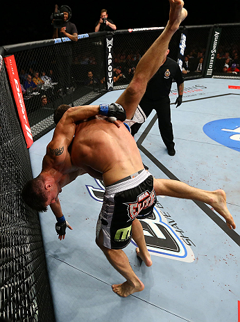 TORONTO, CANADA - SEPTEMBER 22: (L-R) Michael Bisping takes down Brian Stann during their middleweight bout at UFC 152 inside Air Canada Centre on September 22, 2012 in Toronto, Ontario, Canada. (Photo by Al Bello/Zuffa LLC/Zuffa LLC via Getty Images)