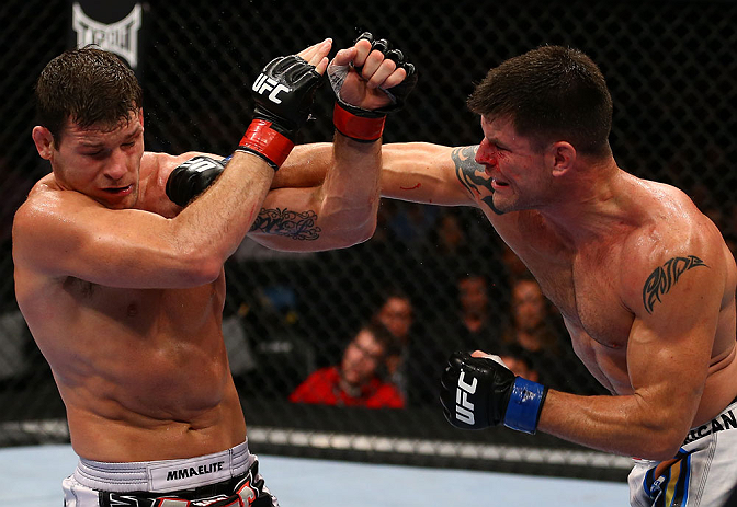 TORONTO, CANADA - SEPTEMBER 22: (R-L) Brian Stann punches Michael Bisping during their middleweight bout at UFC 152 inside Air Canada Centre on September 22, 2012 in Toronto, Ontario, Canada. (Photo by Al Bello/Zuffa LLC/Zuffa LLC via Getty Images)