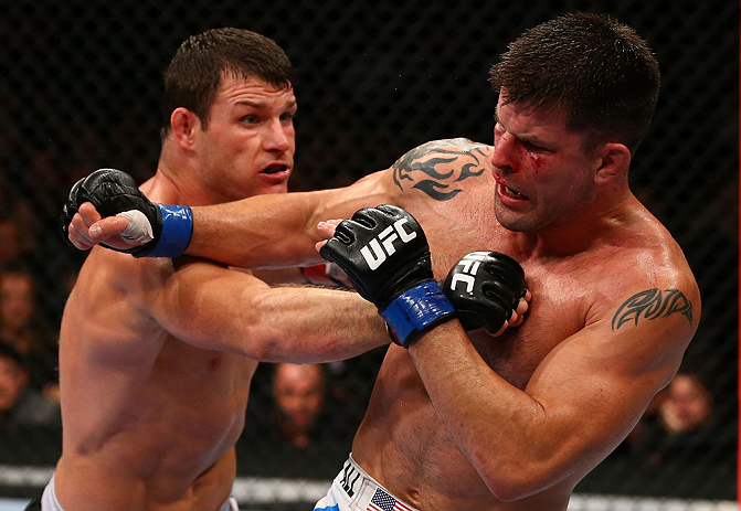 TORONTO, CANADA - SEPTEMBER 22: (L-R) Michael Bisping punches Brian Stann during their middleweight bout at UFC 152 inside Air Canada Centre on September 22, 2012 in Toronto, Ontario, Canada. (Photo by Al Bello/Zuffa LLC/Zuffa LLC via Getty Images)