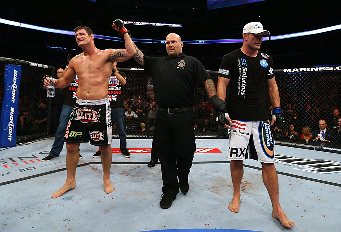 TORONTO, CANADA - SEPTEMBER 22: Michael Bisping (L) reacts after defeating Brian Stann (R) during their middleweight bout at UFC 152 inside Air Canada Centre on September 22, 2012 in Toronto, Ontario, Canada. (Photo by Al Bello/Zuffa LLC/Zuffa LLC via Getty Images)