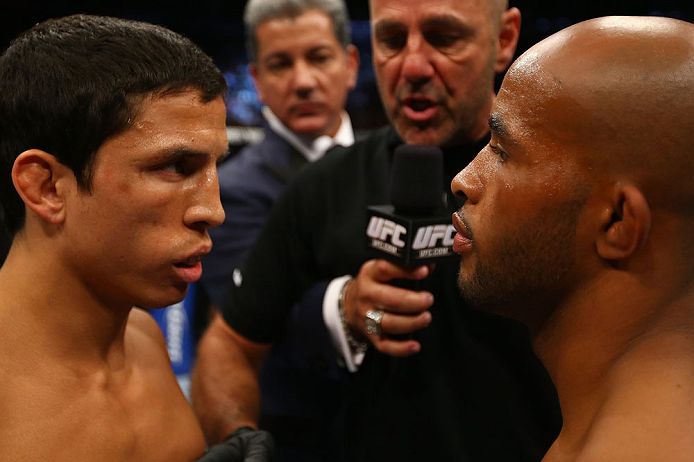 TORONTO, CANADA - SEPTEMBER 22: Opponents Joseph Benavidez (L) and Demetrious Johnson (R) receive final instructions from referee Yves Lavigne before their flyweight championship bout at UFC 152 inside Air Canada Centre on September 22, 2012 in Toronto, Ontario, Canada. (Photo by Al Bello/Zuffa LLC/Zuffa LLC via Getty Images)