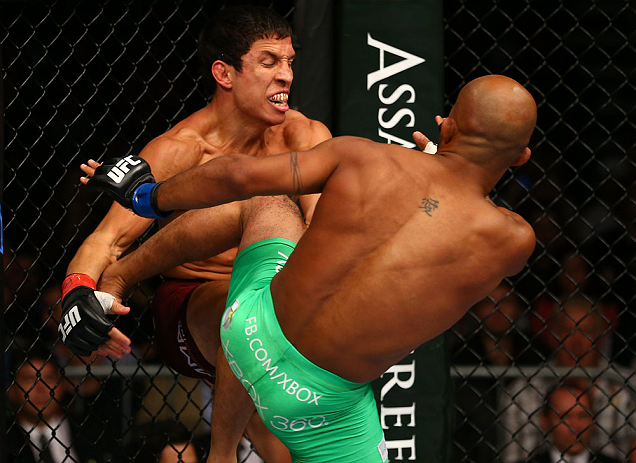 TORONTO, CANADA - SEPTEMBER 22: (R-L) Demetrious Johnson kicks Joseph Benavidez during their flyweight championship bout at UFC 152 inside Air Canada Centre on September 22, 2012 in Toronto, Ontario, Canada. (Photo by Al Bello/Zuffa LLC/Zuffa LLC via Getty Images)