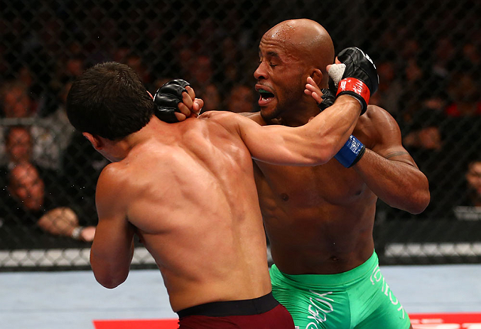 TORONTO, CANADA - SEPTEMBER 22: (R-L) Demetrious Johnson and Joseph Benavidez trade punches during their flyweight championship bout at UFC 152 inside Air Canada Centre on September 22, 2012 in Toronto, Ontario, Canada. (Photo by Al Bello/Zuffa LLC/Zuffa LLC via Getty Images)