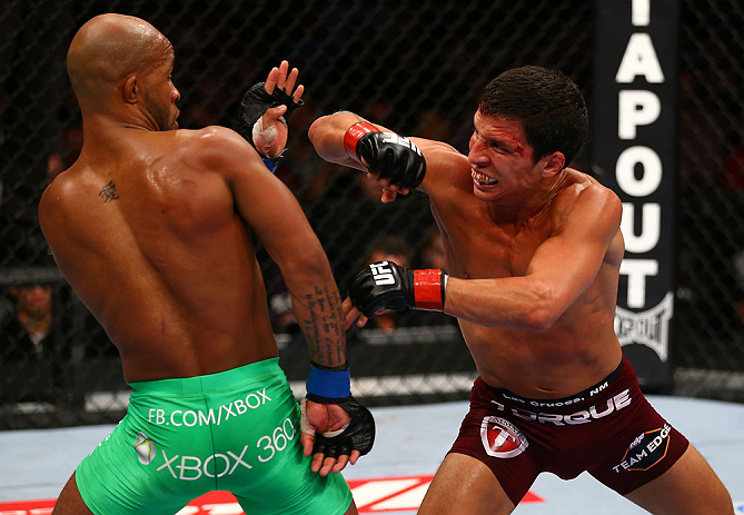 TORONTO, CANADA - SEPTEMBER 22: (R-L) Joseph Benavidez delivers an elbow against Demetrious Johnson during their flyweight championship bout at UFC 152 inside Air Canada Centre on September 22, 2012 in Toronto, Ontario, Canada. (Photo by Al Bello/Zuffa LLC/Zuffa LLC via Getty Images)