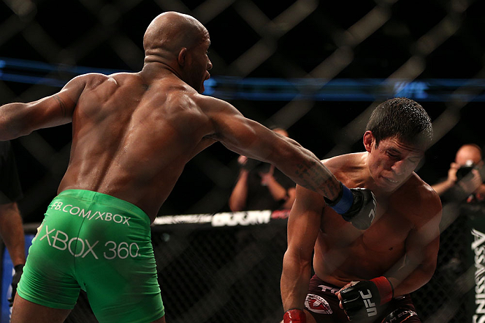 TORONTO, CANADA - SEPTEMBER 22:    (L-R) Demetrious Johnson punches Joseph Benavidez during their flyweight championship bout at UFC 152 inside Air Canada Centre on September 22, 2012 in Toronto, Ontario, Canada.  (Photo by Josh Hedges/Zuffa LLC/Zuffa LLC via Getty Images)