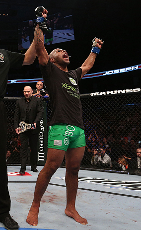 TORONTO, CANADA - SEPTEMBER 22: Demetrious Johnson reacts after defeating Joseph Benavidez during their flyweight championship bout at UFC 152 inside Air Canada Centre on September 22, 2012 in Toronto, Ontario, Canada. (Photo by Josh Hedges/Zuffa LLC/Zuffa LLC via Getty Images)