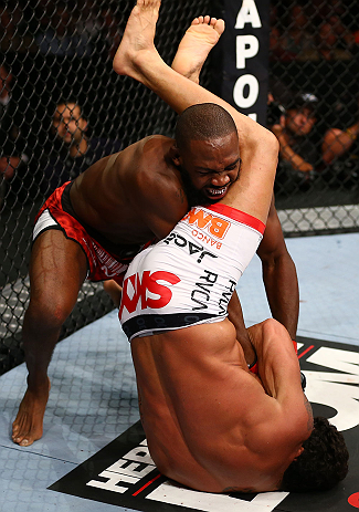 TORONTO, CANADA - SEPTEMBER 22: Vitor Belfort attempts an armbar submission against Jon Jones (top) during their light heavyweight championship bout at UFC 152