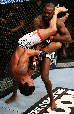 TORONTO, CANADA - SEPTEMBER 22: Vitor Belfort attempts an armbar submission against Jon Jones (top) during their light heavyweight championship bout at UFC 152