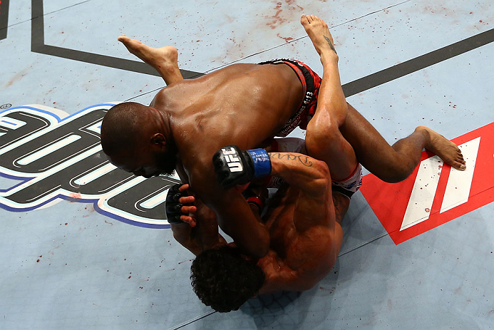 Jon Jones (top) delivers an elbow against Vitor Belfort during their light heavyweight championship bout at UFC 152 inside Air Canada Centre on September 22, 2012 in Toronto, Ontario, Canada. (Photo by Al Bello/Zuffa LLC/Zuffa LLC via Getty Images)