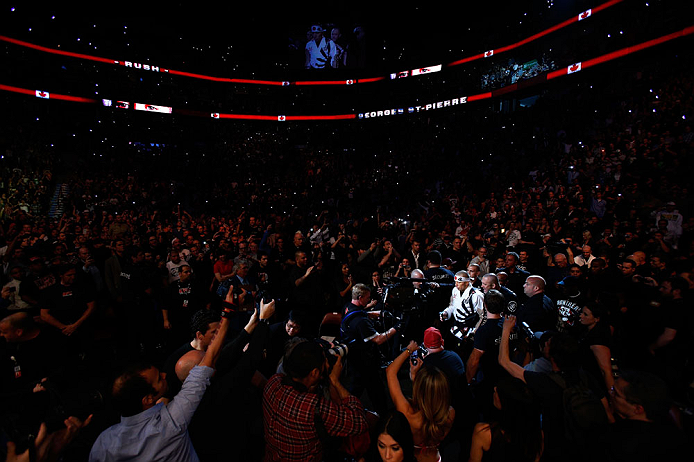 MONTREAL, QC - NOVEMBER 17:  Georges St-Pierre walks into the arena prior to fighting against Carlos Condit for the welterweight title bout during UFC 154 on November 17, 2012  at the Bell Centre in Montreal, Canada.  (Photo by Josh Hedges/Zuffa LLC/Zuffa LLC via Getty Images)