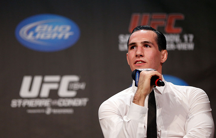 MONTREAL, CANADA - NOVEMBER 16: Rory MacDonald interacts with fans during a Q&A session before the official UFC 154 weigh in at New City Gas on November 16, 2012 in Montreal, Quebec, Canada. (Photo by Josh Hedges/Zuffa LLC/Zuffa LLC via Getty Images)