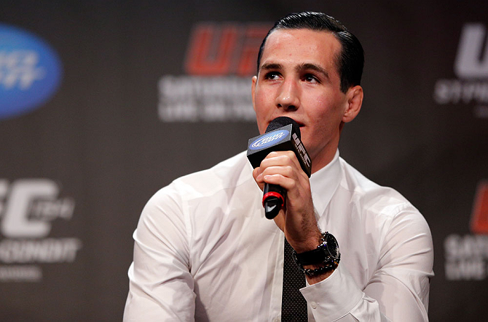 MONTREAL, CANADA - NOVEMBER 16: Rory MacDonald interacts with fans during a Q&A session before the official UFC 154 weigh in at New City Gas on November 16, 2012 in Montreal, Quebec, Canada. (Photo by Josh Hedges/Zuffa LLC/Zuffa LLC via Getty Images)
