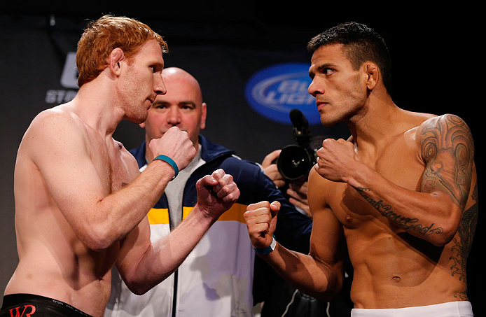 MONTREAL, CANADA - NOVEMBER 16:  (L-R) Opponents Mark Bocek and Rafael dos Anjos face off during the official UFC 154 weigh in at New City Gas on November 16, 2012 in Montreal, Quebec, Canada.  (Photo by Josh Hedges/Zuffa LLC/Zuffa LLC via Getty Images)