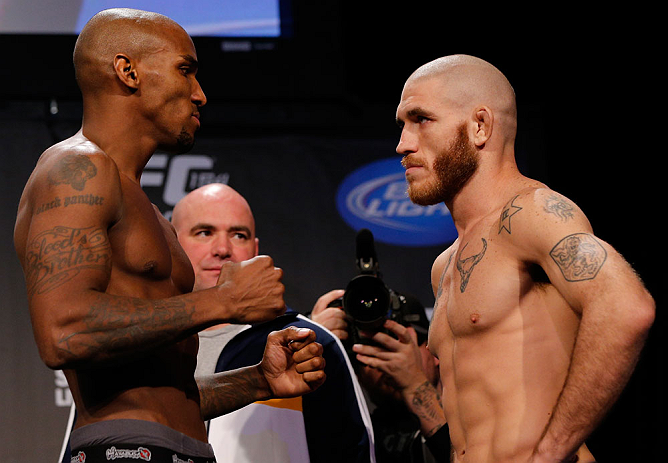 MONTREAL, CANADA - NOVEMBER 16: (L-R) Opponents Francis Carmont and Tom Lawlor face off during the official UFC 154 weigh in at New City Gas on November 16, 2012 in Montreal, Quebec, Canada. (Photo by Josh Hedges/Zuffa LLC/Zuffa LLC via Getty Images)