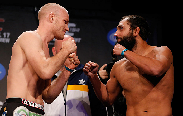 MONTREAL, CANADA - NOVEMBER 16: (L-R) Opponents Martin Kampmann and Johny Hendricks face off during the official UFC 154 weigh in at New City Gas on November 16, 2012 in Montreal, Quebec, Canada. (Photo by Josh Hedges/Zuffa LLC/Zuffa LLC via Getty Images)