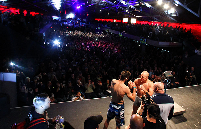 MONTREAL, CANADA - NOVEMBER 16: (R-L) opponents Georges St-Pierre and Carlos Condit face off during the official UFC 154 weigh in at New City Gas on November 16, 2012 in Montreal, Quebec, Canada. (Photo by Josh Hedges/Zuffa LLC/Zuffa LLC via Getty Images)