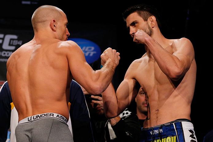 MONTREAL, CANADA - NOVEMBER 16: (L-R) Opponents Georges St-Pierre and Carlos Condit face off during the official UFC 154 weigh in at New City Gas on November 16, 2012 in Montreal, Quebec, Canada. (Photo by Josh Hedges/Zuffa LLC/Zuffa LLC via Getty Images)