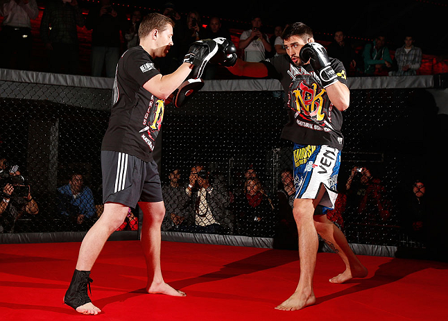 MONTREAL, CANADA - NOVEMBER 15:  Carlos Condit works out for media and fans during an open training session ahead of UFC 154 at New City Gas on November 15, 2012 in Montreal, Quebec, Canada.  (Photo by Josh Hedges/Zuffa LLC/Zuffa LLC via Getty Images)