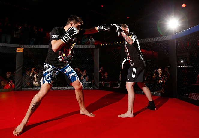 MONTREAL, CANADA - NOVEMBER 15:  Carlos Condit works out for media and fans during an open training session ahead of UFC 154 at New City Gas on November 15, 2012 in Montreal, Quebec, Canada.  (Photo by Josh Hedges/Zuffa LLC/Zuffa LLC via Getty Images)