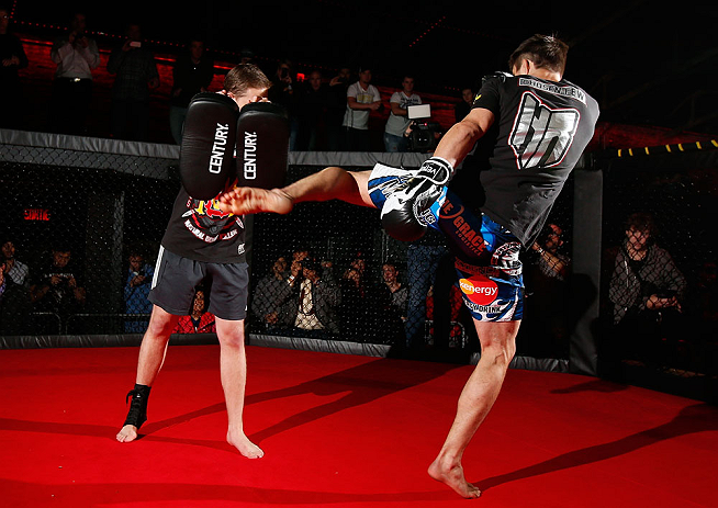 MONTREAL, CANADA - NOVEMBER 15:  Carlos Condit works out for media and fans during an open training session ahead of UFC 154 at New City Gas on November 15, 2012 in Montreal, Quebec, Canada.  (Photo by Josh Hedges/Zuffa LLC/Zuffa LLC via Getty Images)