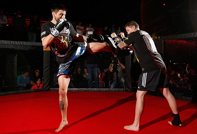 MONTREAL, CANADA - NOVEMBER 15:  Carlos Condit works out for media and fans during an open training session ahead of UFC 154 at New City Gas on November 15, 2012 in Montreal, Quebec, Canada.  (Photo by Josh Hedges/Zuffa LLC/Zuffa LLC via Getty Images)