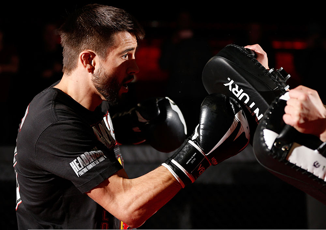 MONTREAL, CANADA - NOVEMBER 15:  Carlos Condit works out for media and fans during an open training session ahead of UFC 154 at New City Gas on November 15, 2012 in Montreal, Quebec, Canada.  (Photo by Josh Hedges/Zuffa LLC/Zuffa LLC via Getty Images)
