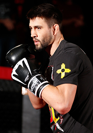 MONTREAL, CANADA - NOVEMBER 15:  Carlos Condit works out for media and fans during an open training session ahead of UFC 154 at New City Gas on November 15, 2012 in Montreal, Quebec, Canada.  (Photo by Josh Hedges/Zuffa LLC/Zuffa LLC via Getty Images)