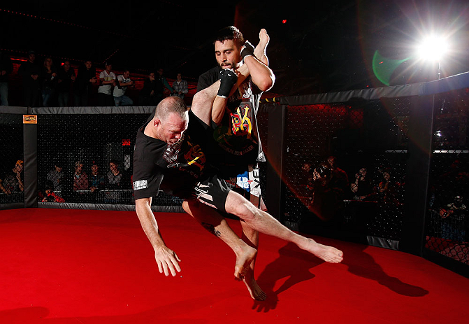 MONTREAL, CANADA - NOVEMBER 15:  Carlos Condit works out for media and fans during an open training session ahead of UFC 154 at New City Gas on November 15, 2012 in Montreal, Quebec, Canada.  (Photo by Josh Hedges/Zuffa LLC/Zuffa LLC via Getty Images)