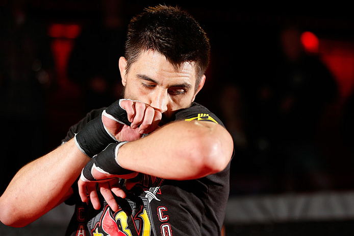 MONTREAL, CANADA - NOVEMBER 15:  Carlos Condit works out for media and fans during an open training session ahead of UFC 154 at New City Gas on November 15, 2012 in Montreal, Quebec, Canada.  (Photo by Josh Hedges/Zuffa LLC/Zuffa LLC via Getty Images)