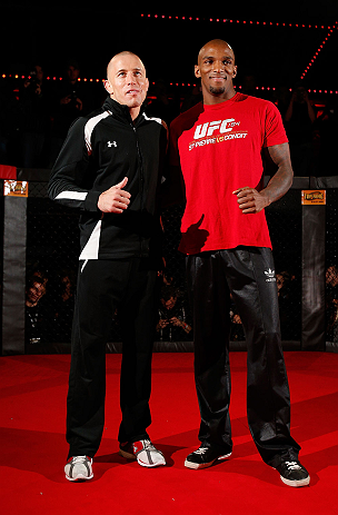 MONTREAL, CANADA - NOVEMBER 15:  (L-R) Teammates Georges St-Pierre and Francis Carmont pose for photos during an open training session ahead of UFC 154 at New City Gas on November 15, 2012 in Montreal, Quebec, Canada.  (Photo by Josh Hedges/Zuffa LLC/Zuffa LLC via Getty Images)