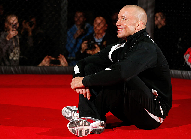 MONTREAL, CANADA - NOVEMBER 15:  Georges St-Pierre sits in the Octagon during an open training session ahead of UFC 154 at New City Gas on November 15, 2012 in Montreal, Quebec, Canada.  (Photo by Josh Hedges/Zuffa LLC/Zuffa LLC via Getty Images)