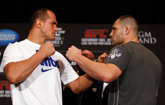 LAS VEGAS, NV - DECEMBER 27: (L-R) Opponents Junior dos Santos and Cain Velasquez face off during the final UFC 155 pre-fight press conference on December 27, 2012 at MGM Grand in Las Vegas, Nevada. (Photo by Josh Hedges/Zuffa LLC/Zuffa LLC via Getty Images)