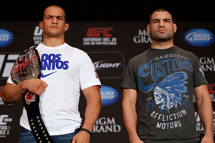 LAS VEGAS, NV - DECEMBER 27: (L-R) Opponents Junior dos Santos and Cain Velasquez pose for photos during the final UFC 155 pre-fight press conference on December 27, 2012 at MGM Grand in Las Vegas, Nevada. (Photo by Josh Hedges/Zuffa LLC/Zuffa LLC via Getty Images)