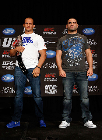 LAS VEGAS, NV - DECEMBER 27: (L-R) Opponents Junior dos Santos and Cain Velasquez pose for photos during the final UFC 155 pre-fight press conference on December 27, 2012 at MGM Grand in Las Vegas, Nevada. (Photo by Josh Hedges/Zuffa LLC/Zuffa LLC via Getty Images)