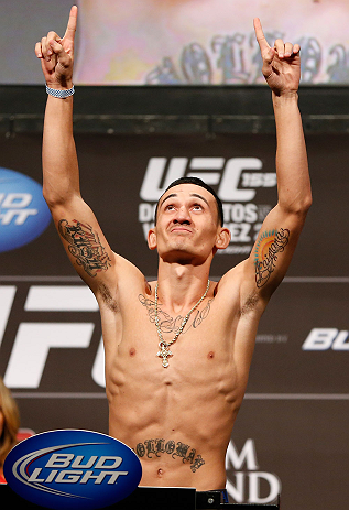 LAS VEGAS, NV - DECEMBER 28: Max Holloway gestures during the UFC 155 weigh-in on December 28, 2012 at MGM Grand Garden Arena in Las Vegas, Nevada. (Photo by Josh Hedges/Zuffa LLC/Zuffa LLC via Getty Images)