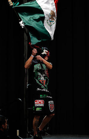 LAS VEGAS, NV - DECEMBER 28: Erik Perez walks on stage in during the UFC 155 weigh-in on December 28, 2012 at MGM Grand Garden Arena in Las Vegas, Nevada. (Photo by Josh Hedges/Zuffa LLC/Zuffa LLC via Getty Images)