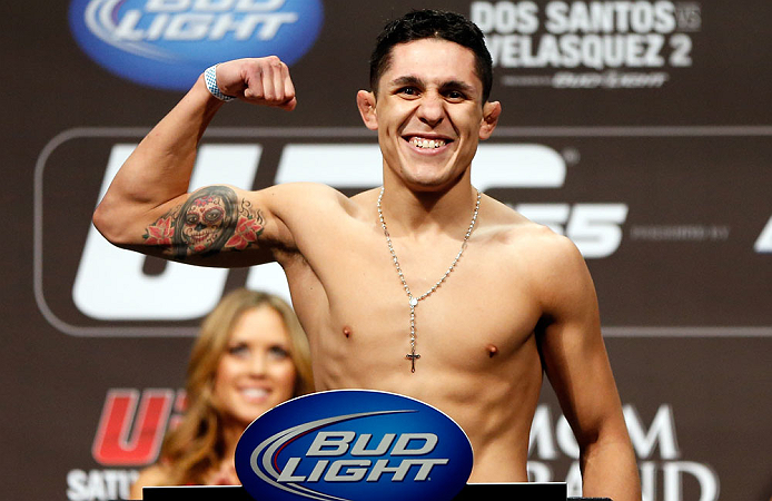LAS VEGAS, NV - DECEMBER 28: Erik Perez flexes during the UFC 155 weigh-in on December 28, 2012 at MGM Grand Garden Arena in Las Vegas, Nevada. (Photo by Josh Hedges/Zuffa LLC/Zuffa LLC via Getty Images)