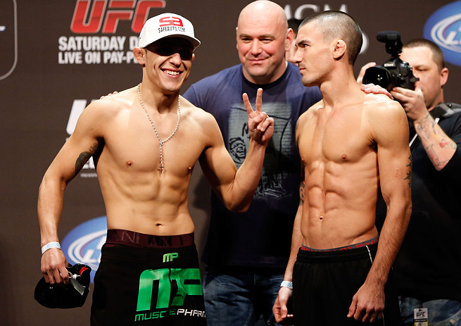 LAS VEGAS, NV - DECEMBER 28: (L-R) Opponents Erik Perez and Byron Bloodworth face off during the UFC 155 weigh-in on December 28, 2012 at MGM Grand Garden Arena in Las Vegas, Nevada. (Photo by Josh Hedges/Zuffa LLC/Zuffa LLC via Getty Images)