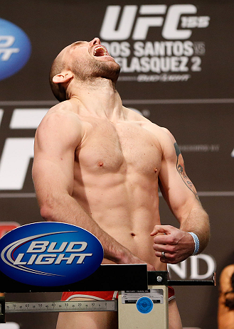 LAS VEGAS, NV - DECEMBER 28: Alan Belcher flexes during the UFC 155 weigh-in on December 28, 2012 at MGM Grand Garden Arena in Las Vegas, Nevada. (Photo by Josh Hedges/Zuffa LLC/Zuffa LLC via Getty Images)