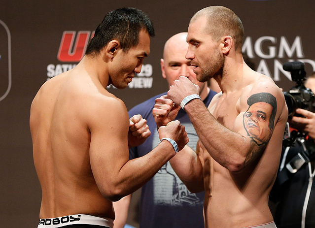 LAS VEGAS, NV - DECEMBER 28: (L-R) Opponents Yushin Okami and Alan Belcher face off during the UFC 155 weigh-in on December 28, 2012 at MGM Grand Garden Arena in Las Vegas, Nevada. (Photo by Josh Hedges/Zuffa LLC/Zuffa LLC via Getty Images)