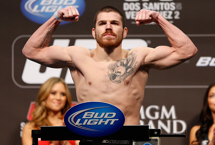 LAS VEGAS, NV - DECEMBER 28: Jim Miller flexes during the UFC 155 weigh-in on December 28, 2012 at MGM Grand Garden Arena in Las Vegas, Nevada. (Photo by Josh Hedges/Zuffa LLC/Zuffa LLC via Getty Images)