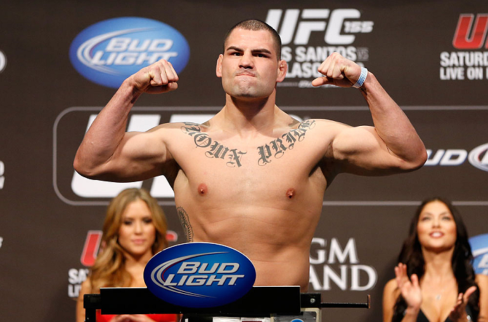 LAS VEGAS, NV - DECEMBER 28: Cain Velasquez flexes during the UFC 155 weigh-in on December 28, 2012 at MGM Grand Garden Arena in Las Vegas, Nevada. (Photo by Josh Hedges/Zuffa LLC/Zuffa LLC via Getty Images)