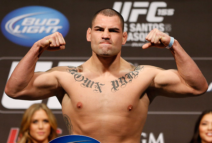 LAS VEGAS, NV - DECEMBER 28: Cain Velasquez flexes during the UFC 155 weigh-in on December 28, 2012 at MGM Grand Garden Arena in Las Vegas, Nevada. (Photo by Josh Hedges/Zuffa LLC/Zuffa LLC via Getty Images)