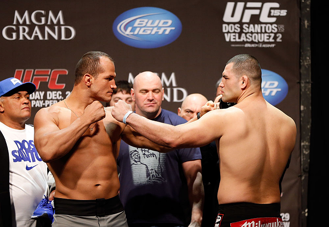 LAS VEGAS, NV - DECEMBER 28: (L-R) UFC Heavyweight Champion Junior dos Santos faces off with challenger Cain Velasquez during the UFC 155 weigh-in on December 28, 2012 at MGM Grand Garden Arena in Las Vegas, Nevada. (Photo by Josh Hedges/Zuffa LLC/Zuffa LLC via Getty Images)