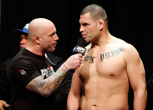 LAS VEGAS, NV - DECEMBER 28: (R-L) UFC heavyweight title challenger Cain Velasquez is interviewed by Joe Rogan during the UFC 155 weigh-in on December 28, 2012 at MGM Grand Garden Arena in Las Vegas, Nevada. (Photo by Josh Hedges/Zuffa LLC/Zuffa LLC via Getty Images)